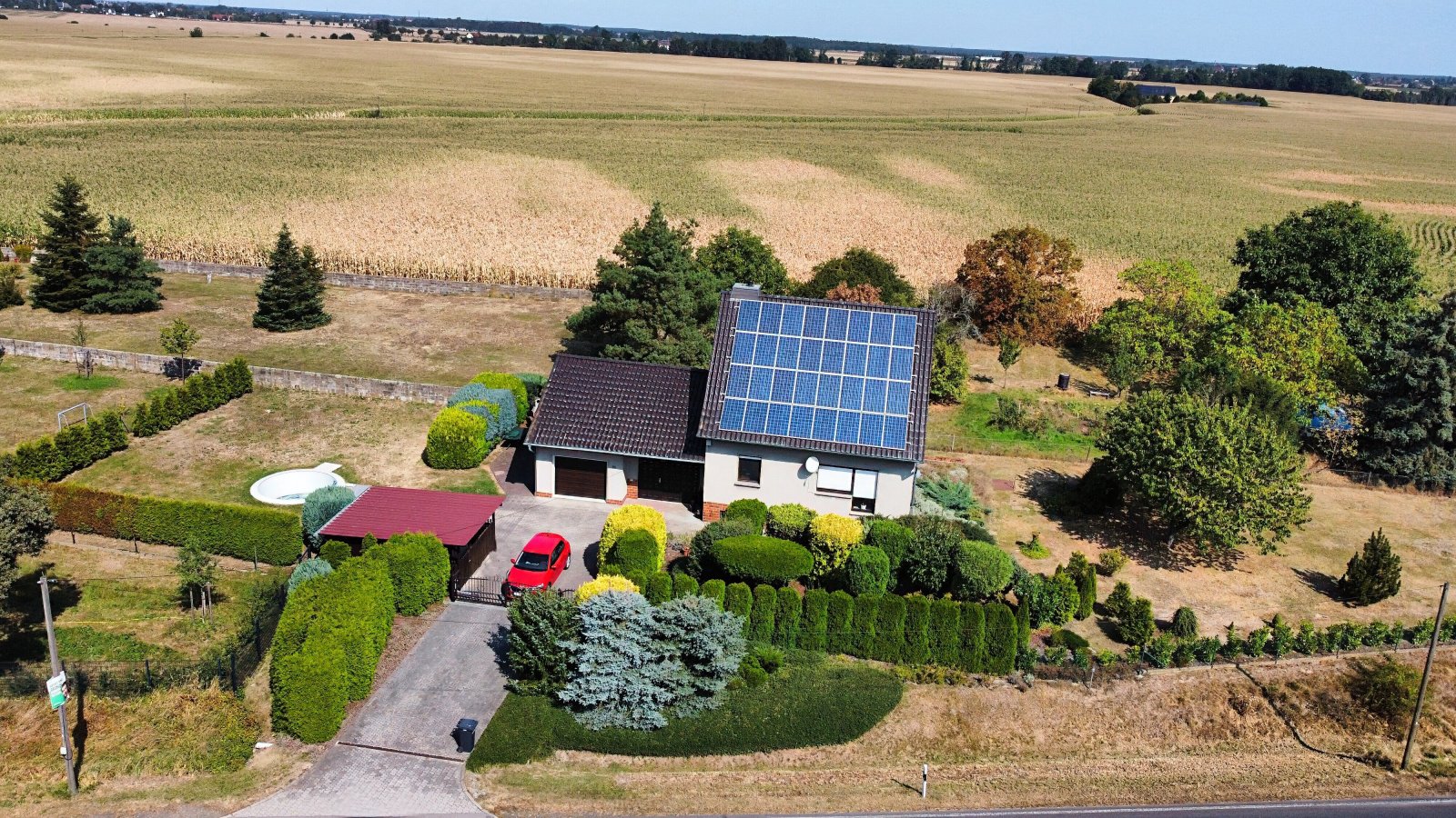 Haus kaufen in 04860 Torgau OT Werdau:  Fast Alleinlage - Gepflegtes Einfamilienhaus mit Photovoltaik, Garage und großem Grundstück 